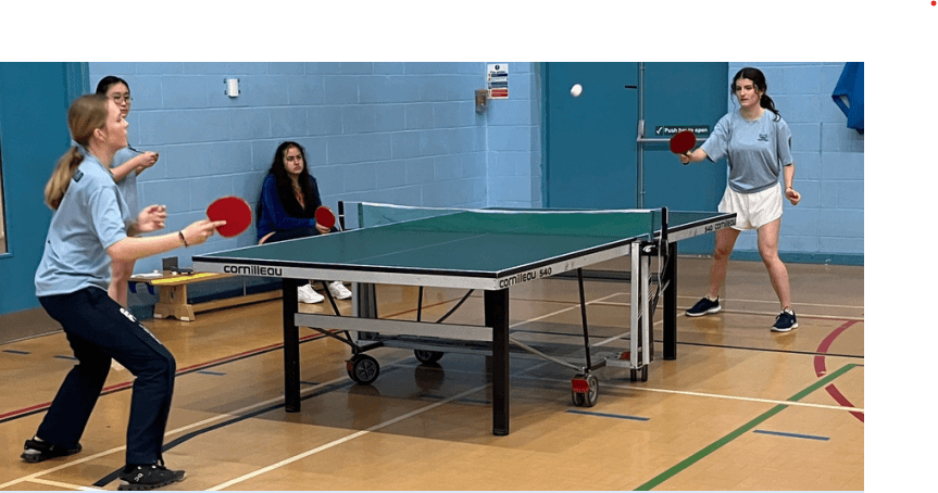 Girls playing table tennis