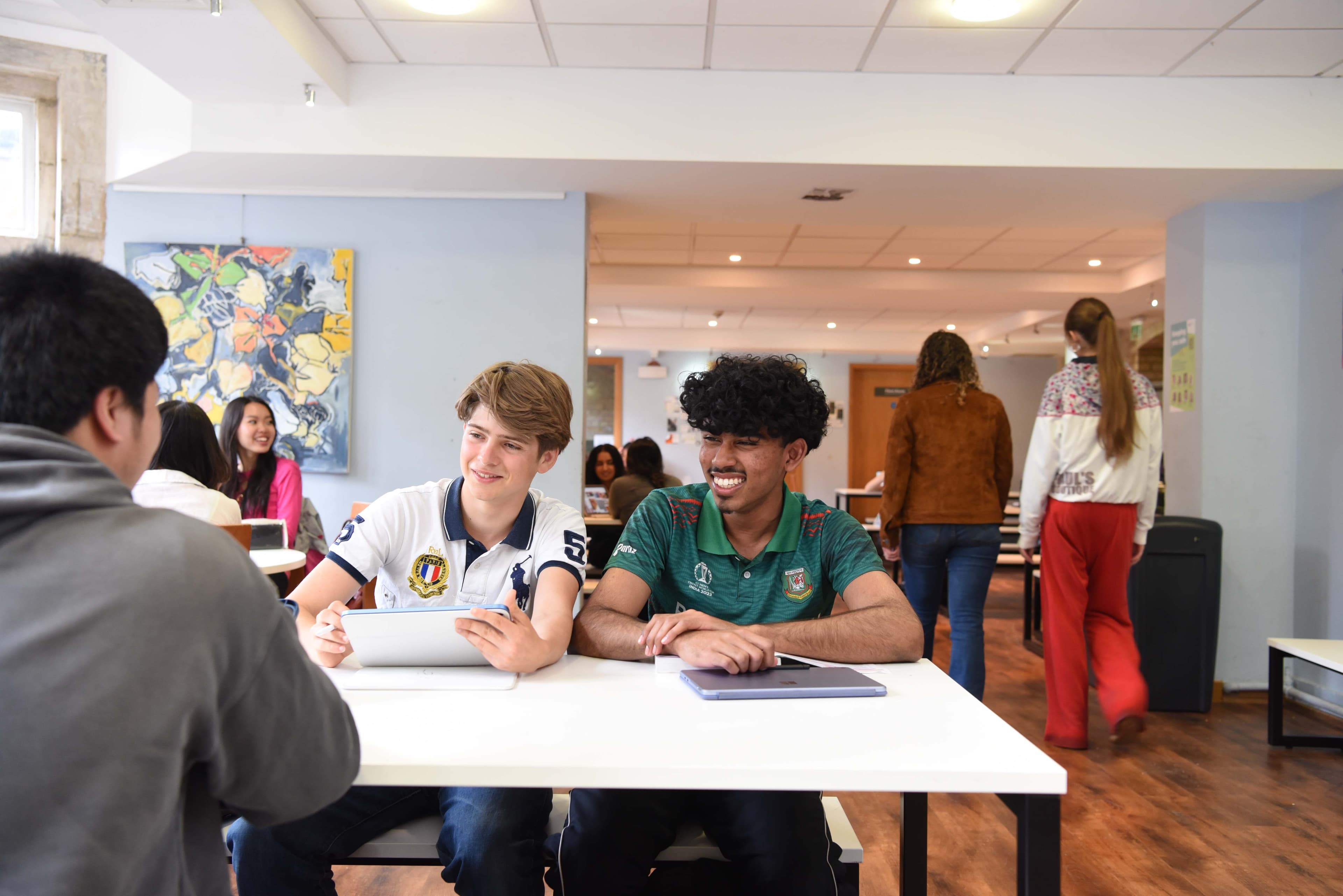 Students relaxing in the hub
