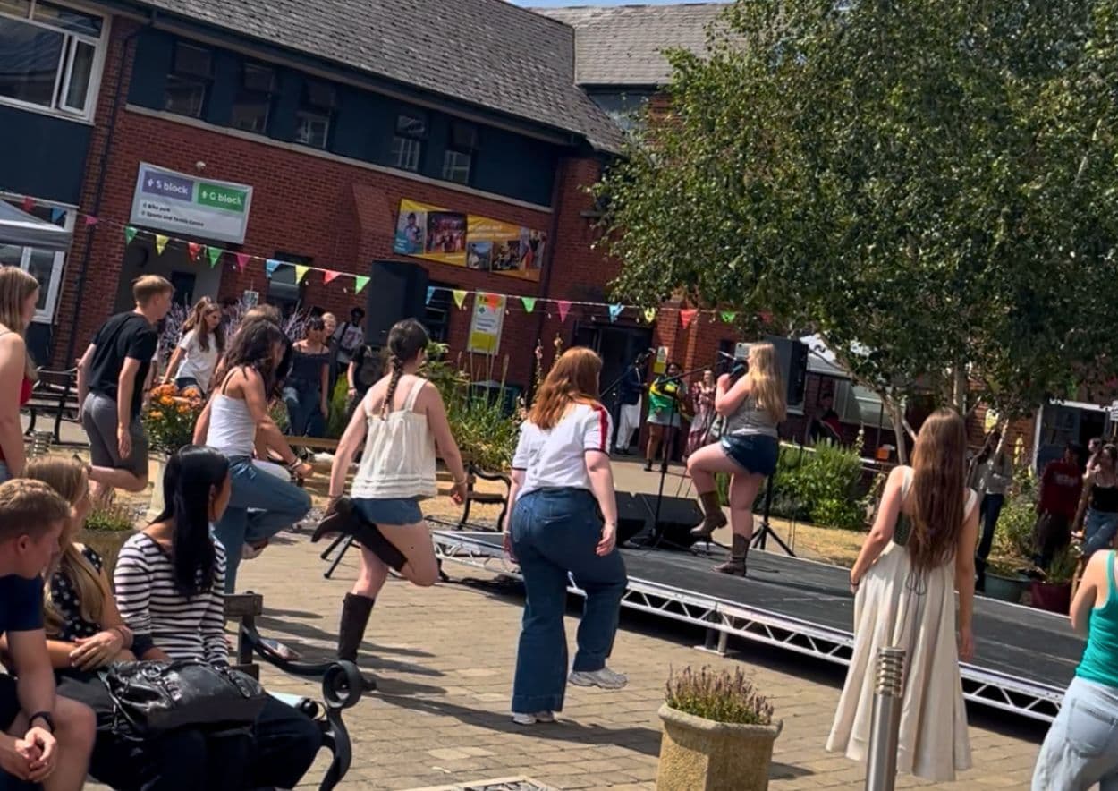 Students leading line dancing