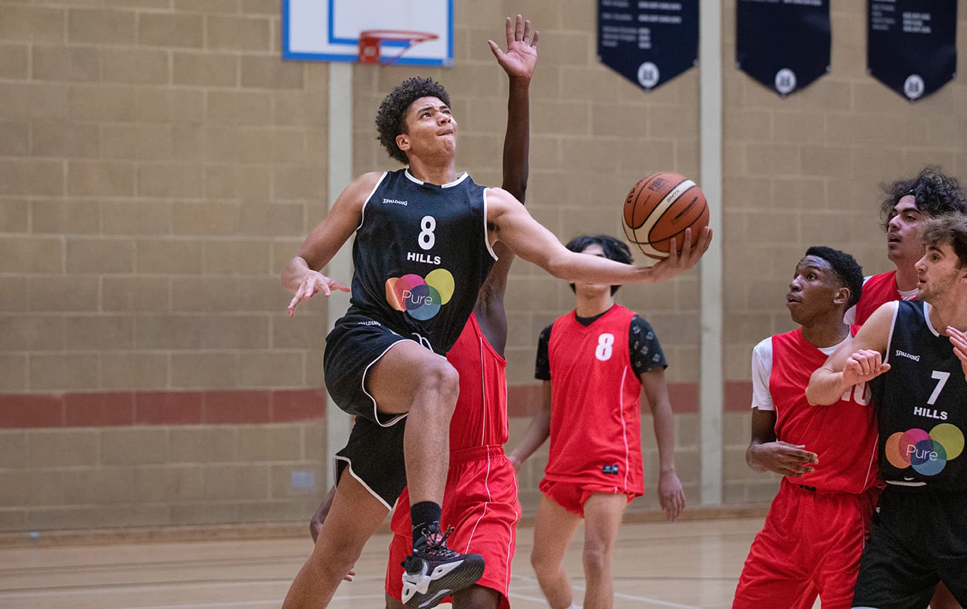 Students playing a Basketball match