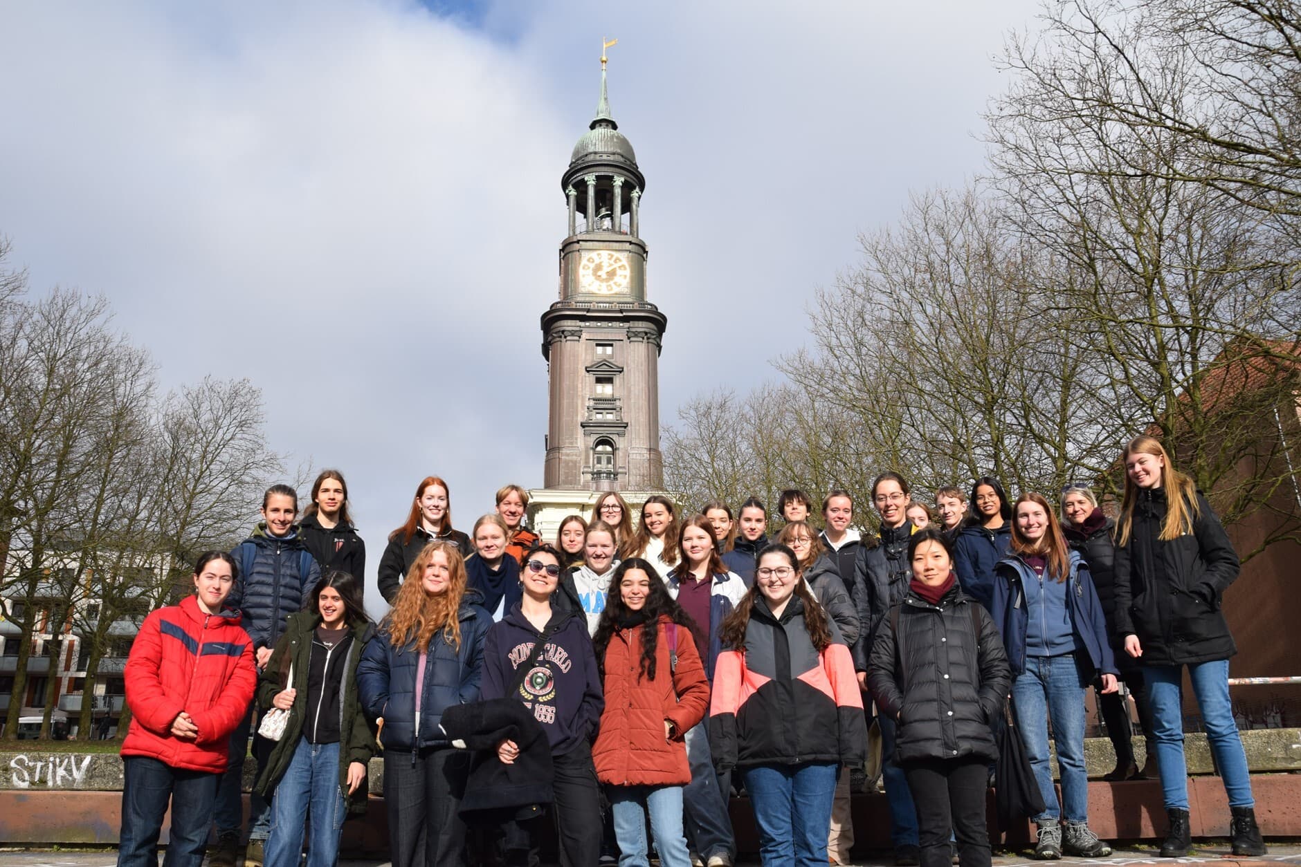 Students outside monument